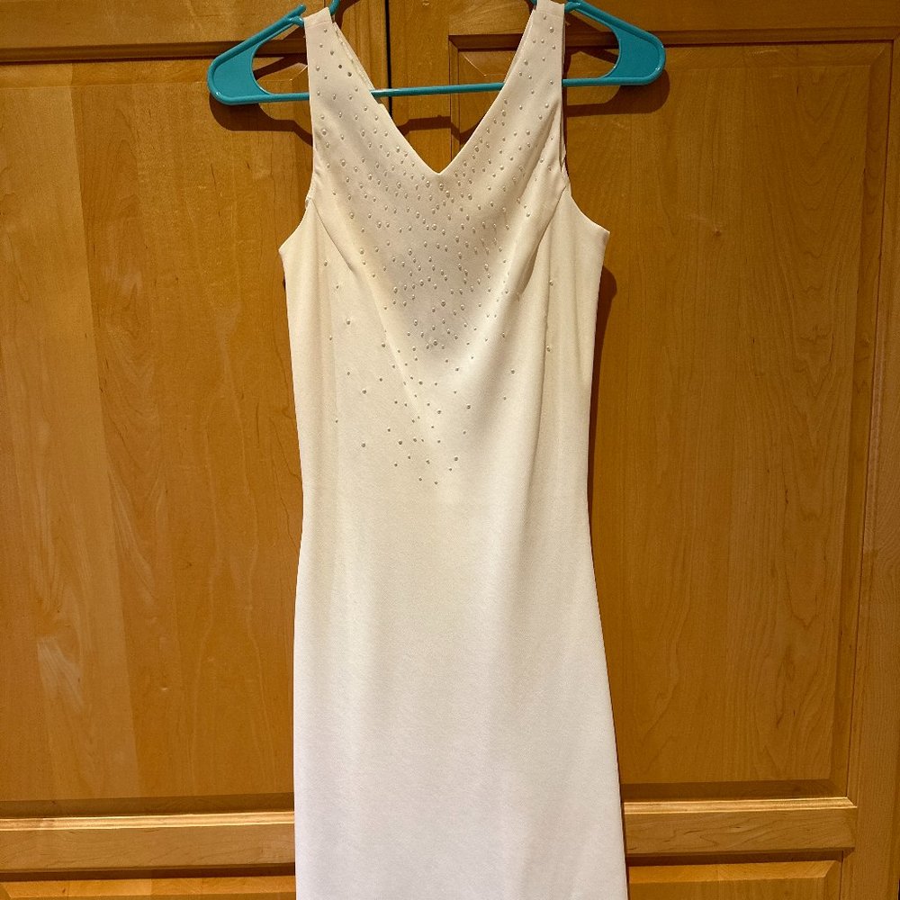 Brand new off-white formal/semi-formal dress. Size 2 Petite